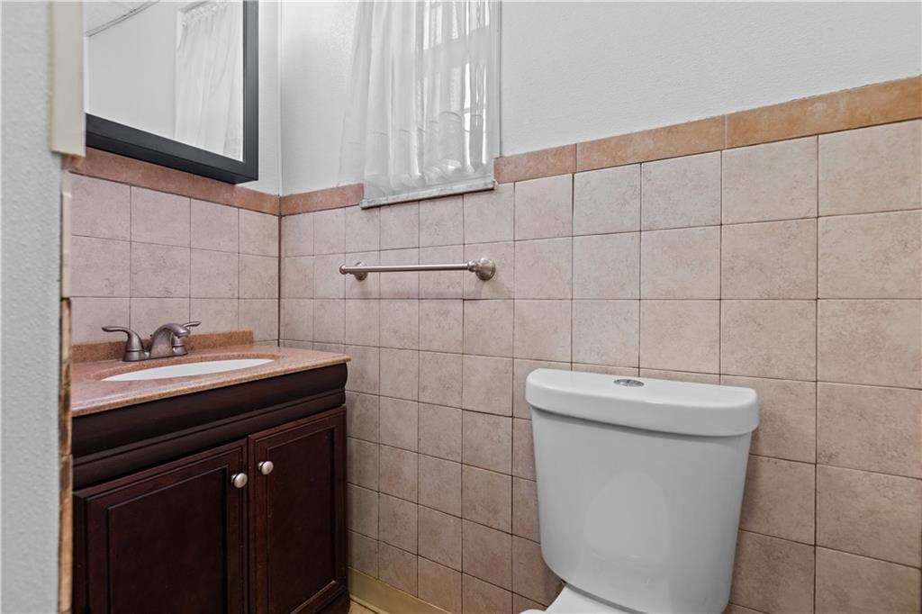 109 Helen Street McKees Rocks, PA 15136 - Photo 19 of 31 a bathroom with a sink and a toilet