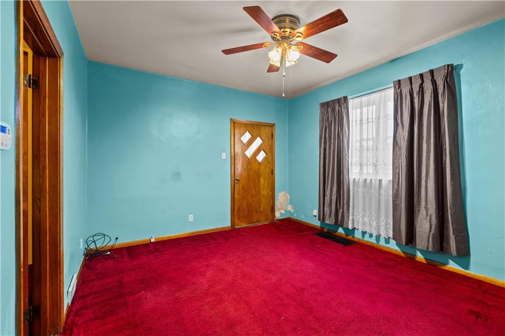 109 Helen Street McKees Rocks, PA 15136 - Photo 10 of 31 an empty room with windows and closet
