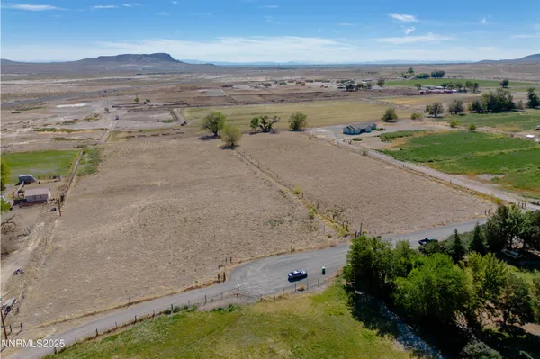 an aerial view of beach and ocean