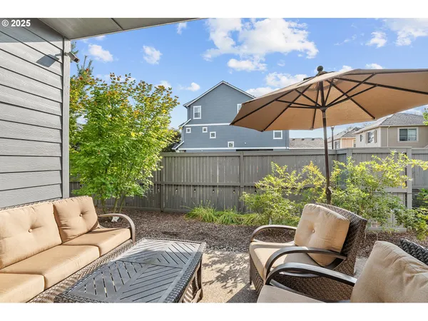 a backyard of a house with seating space