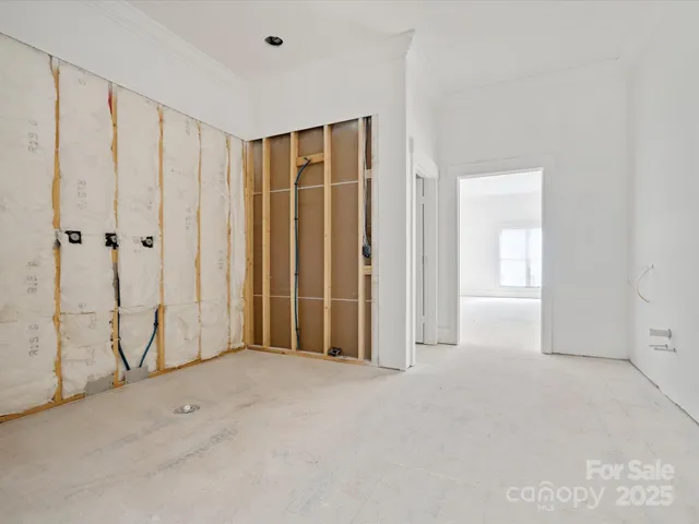 an empty room with a hallway