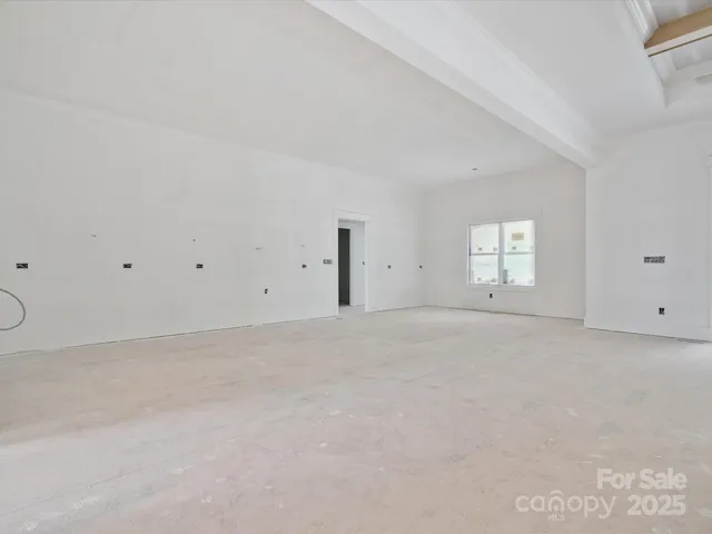 a view of a room with wooden walls