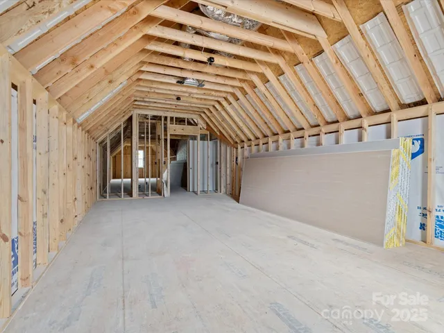 a view of an empty room with glass door