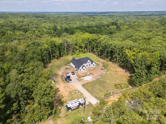 a view of a yard with an outdoor space