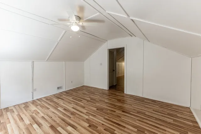 a view of a patio with wooden floor