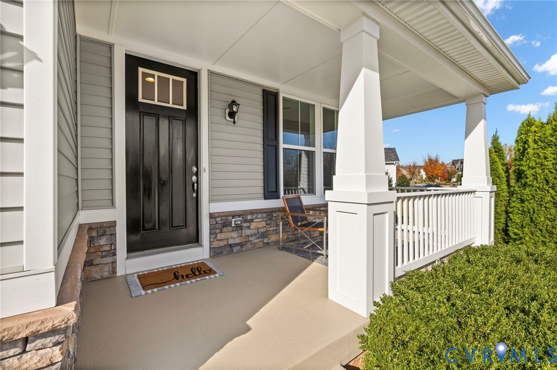 741 Saddlebrook Road Culpeper, VA 22701 - Photo 1 of 1 Doorway to property with stone siding and covered