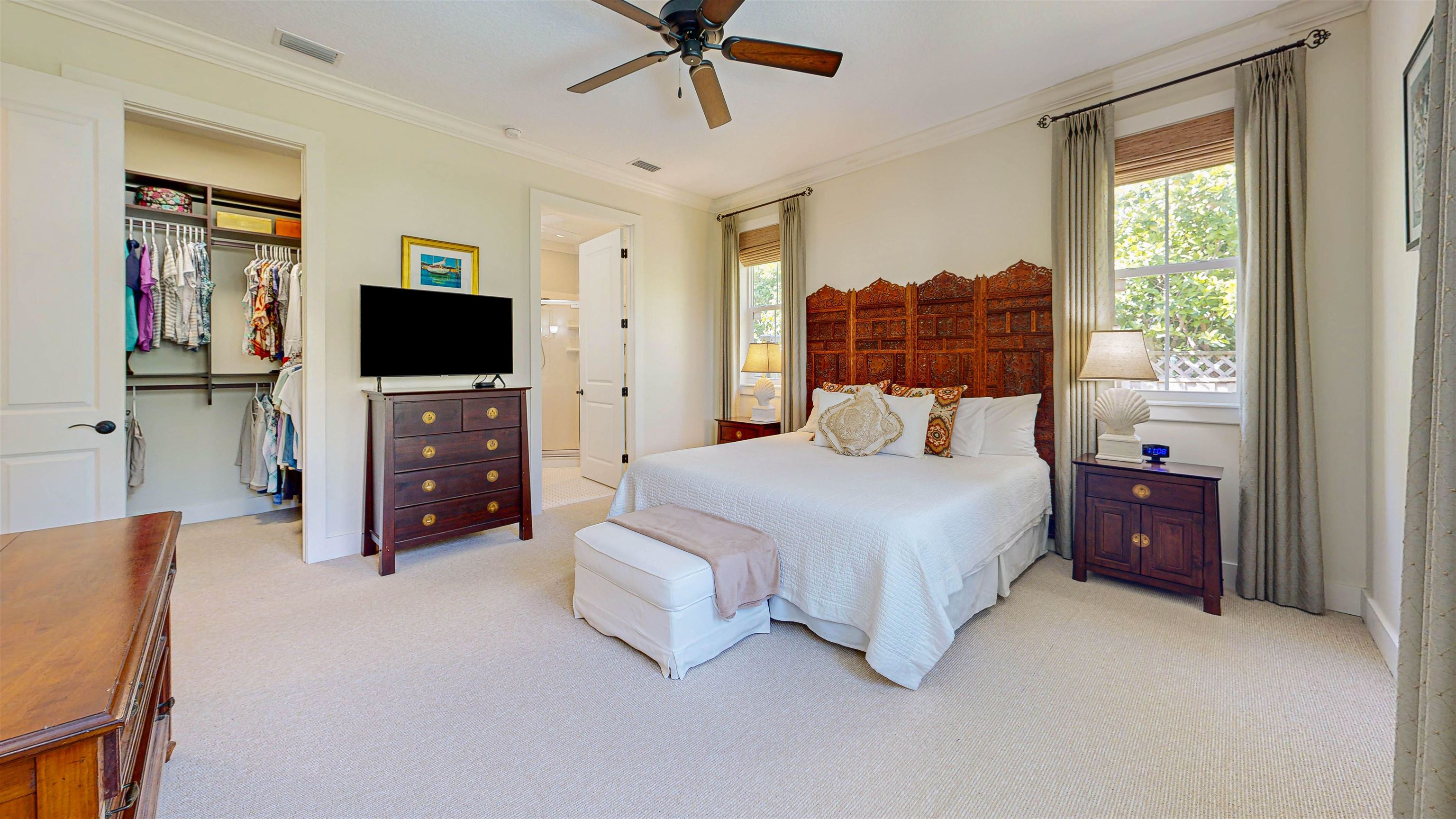 200 12th Street St. Augustine, FL 32080 - Photo 22 of 42 a bedroom with a bed and a flat screen tv