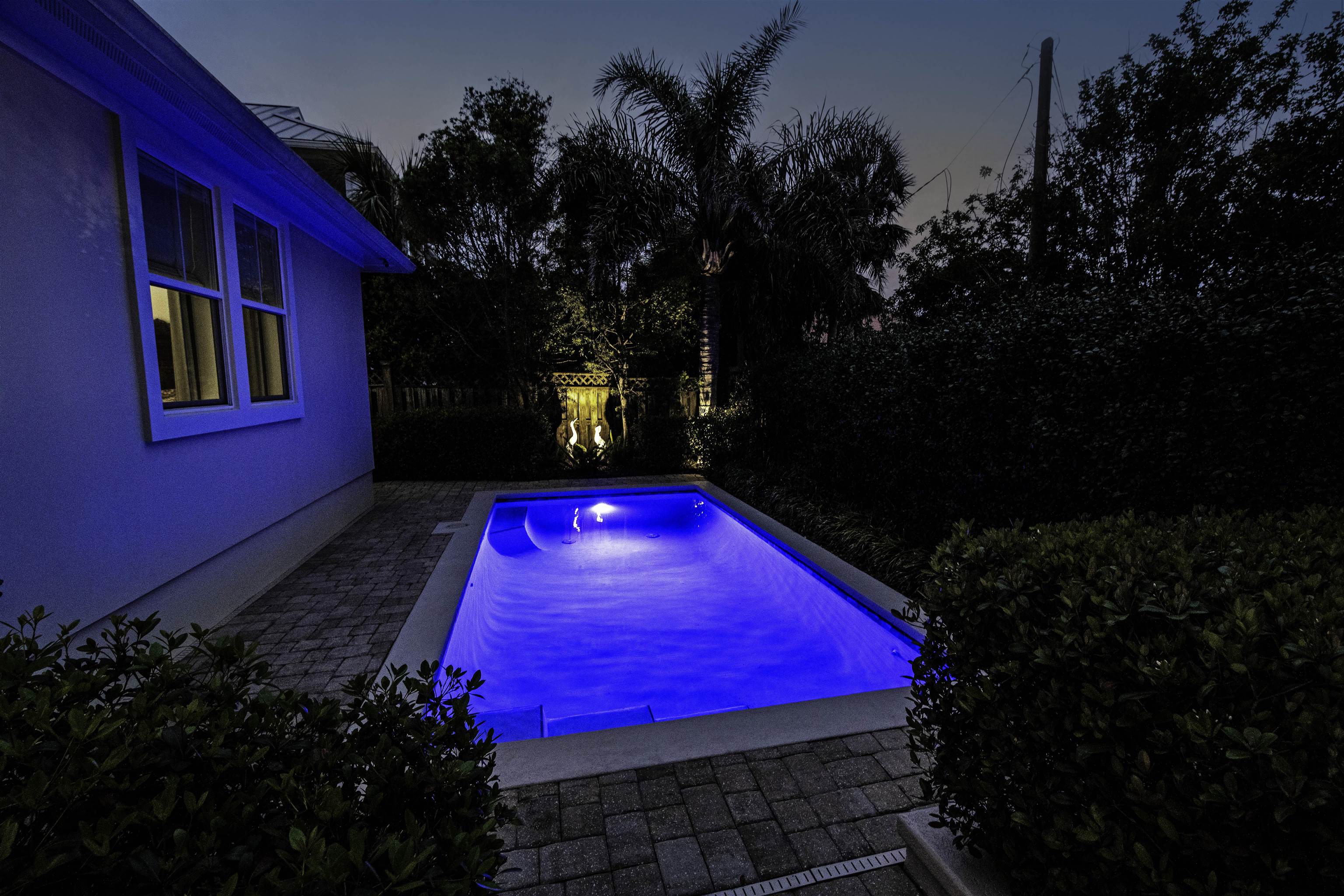 200 12th Street St. Augustine, FL 32080 - Photo 33 of 42 a view of a pool with outdoor seating