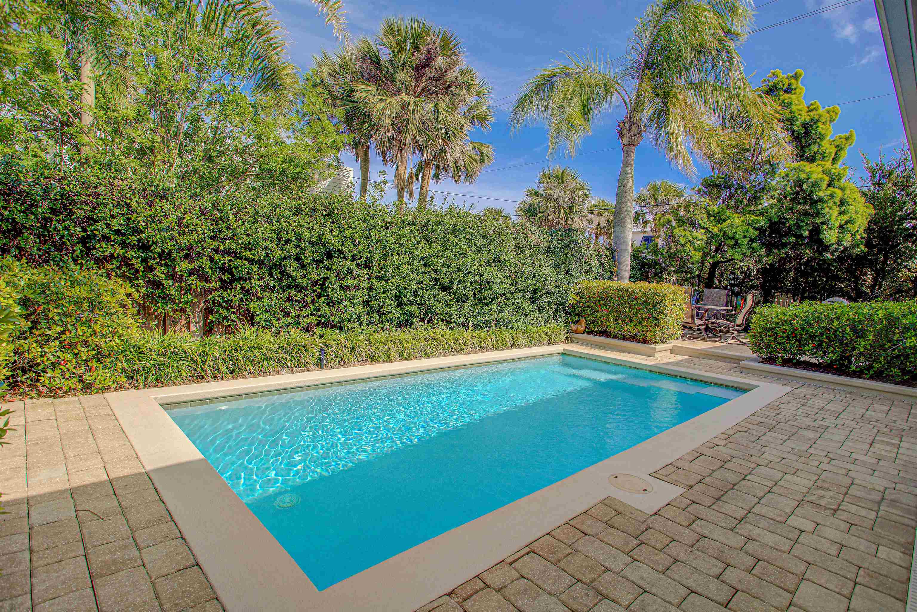 200 12th Street St. Augustine, FL 32080 - Photo 34 of 42 a view of swimming pool with lounge chair
