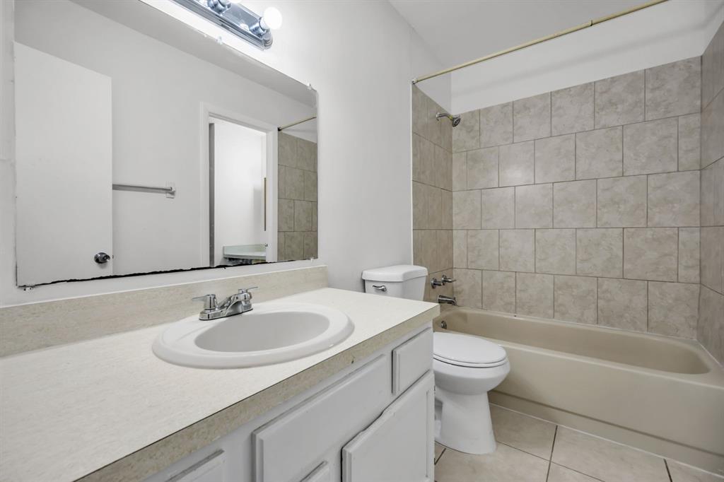 7743 Balboa Street, Unit 7743 Sunrise, FL 33351 - Photo 14 of 21 a bathroom with a sink toilet and shower