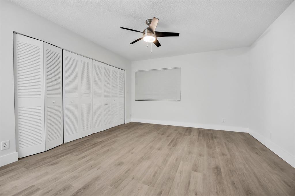 7743 Balboa Street, Unit 7743 Sunrise, FL 33351 - Photo 17 of 21 wooden floor in an empty room