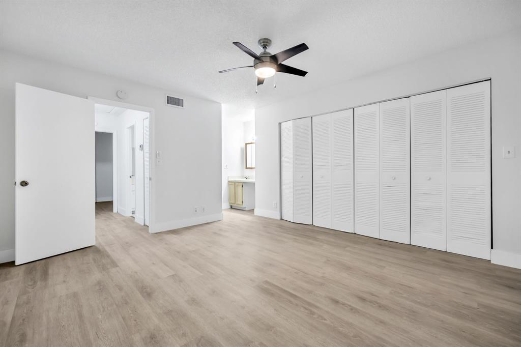 7743 Balboa Street, Unit 7743 Sunrise, FL 33351 - Photo 18 of 21 a view of an empty room with a ceiling fan