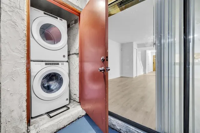 a utility room with dryer and washer