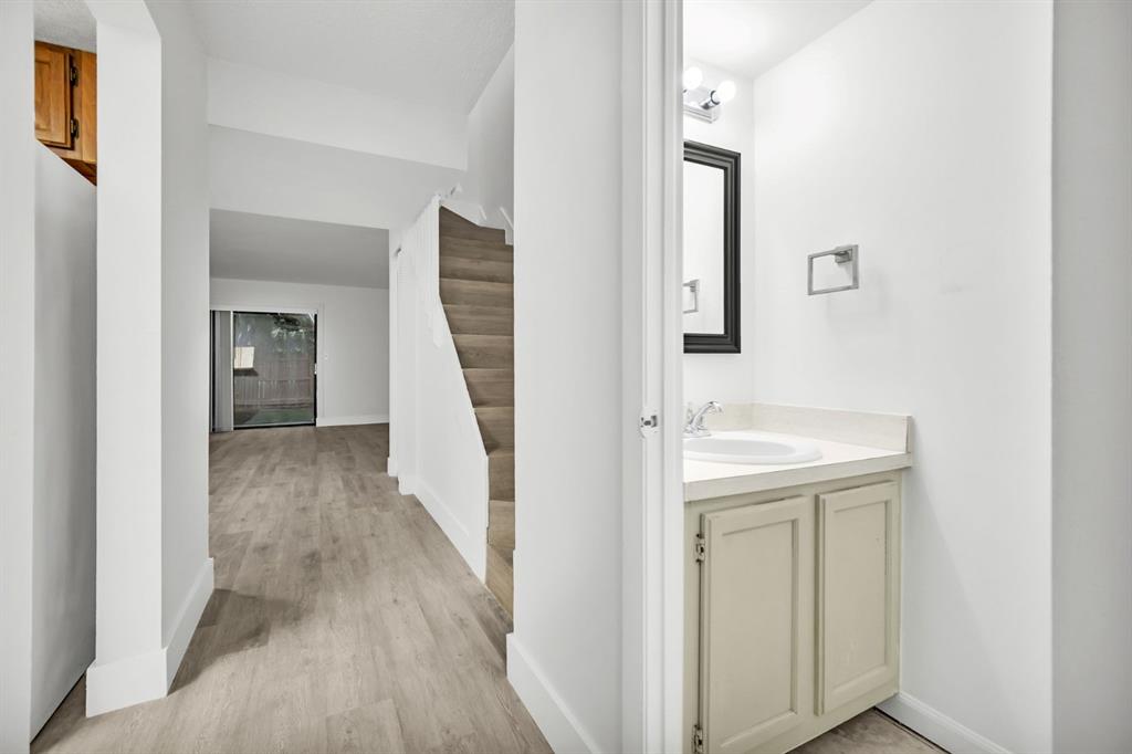 7743 Balboa Street, Unit 7743 Sunrise, FL 33351 - Photo 3 of 21 a view of a hallway with wooden floor and entryway