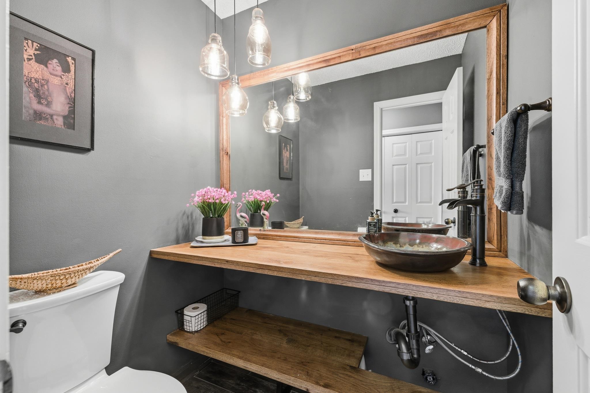 3546 Ripplechase Drive Bartlett, TN 38133 - Photo 14 of 24 a room with a table chairs and chandelier