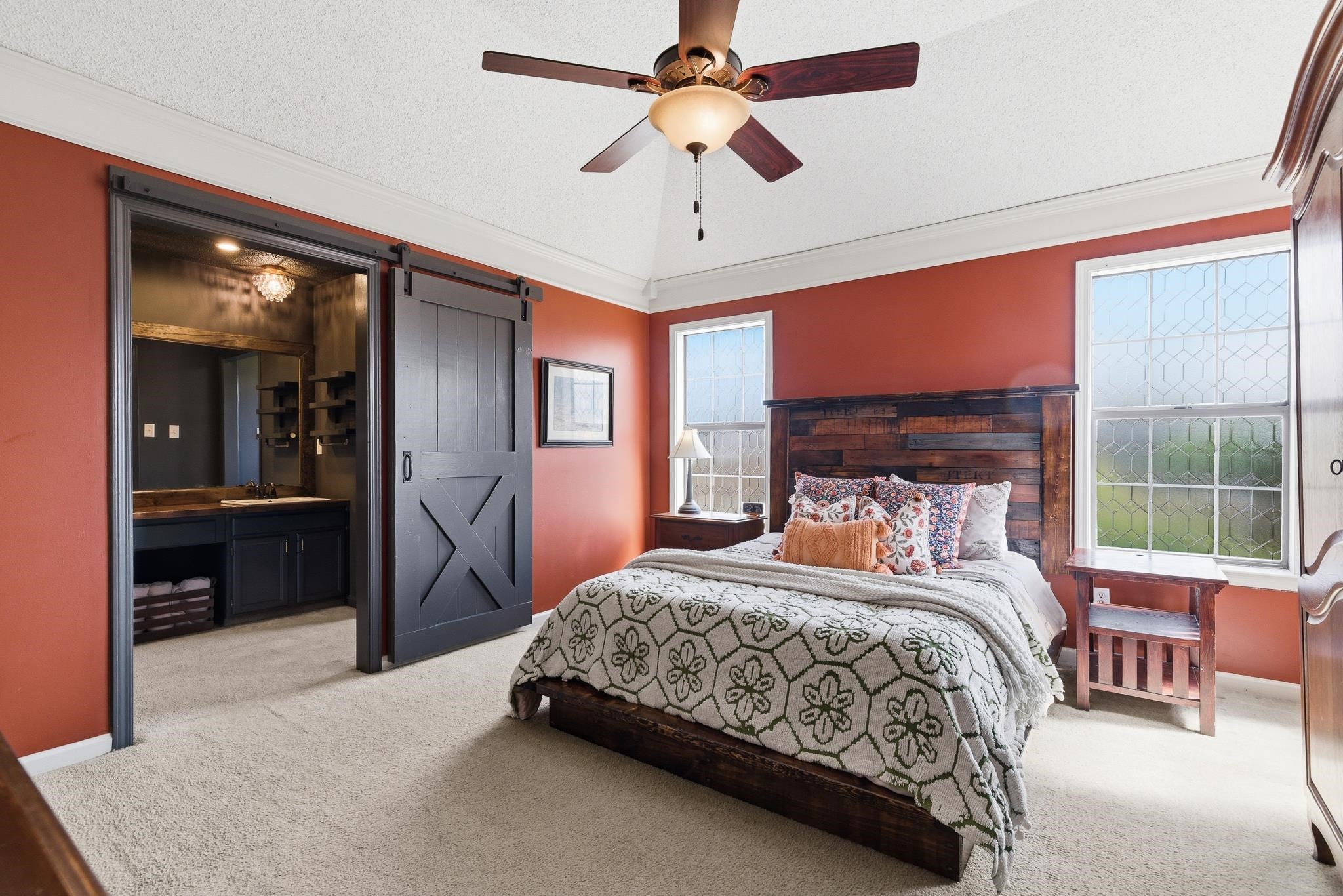 3546 Ripplechase Drive Bartlett, TN 38133 - Photo 15 of 24 a bedroom with a large bed a chandelier and windows