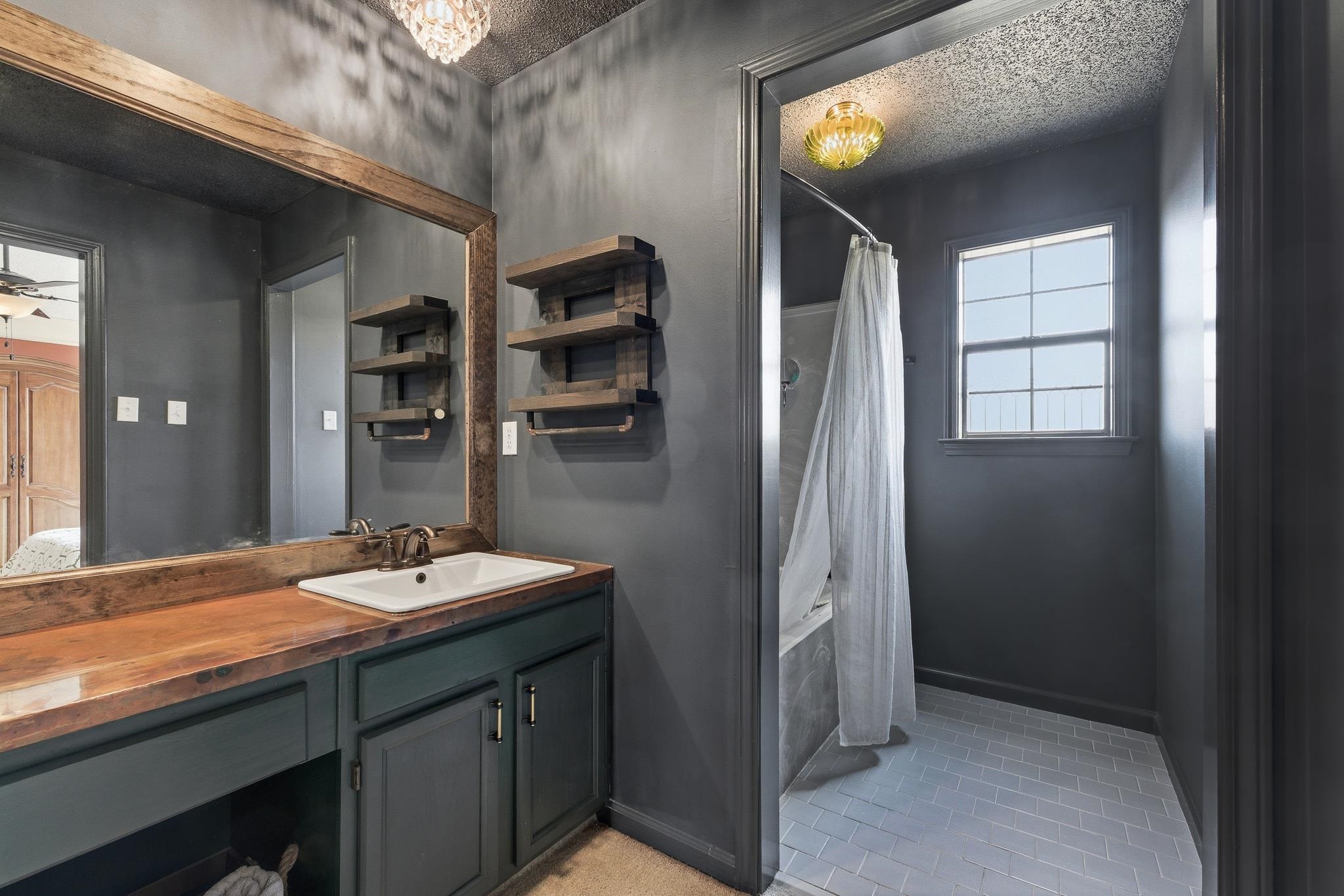 3546 Ripplechase Drive Bartlett, TN 38133 - Photo 18 of 24 a bathroom with double vanity and a mirror