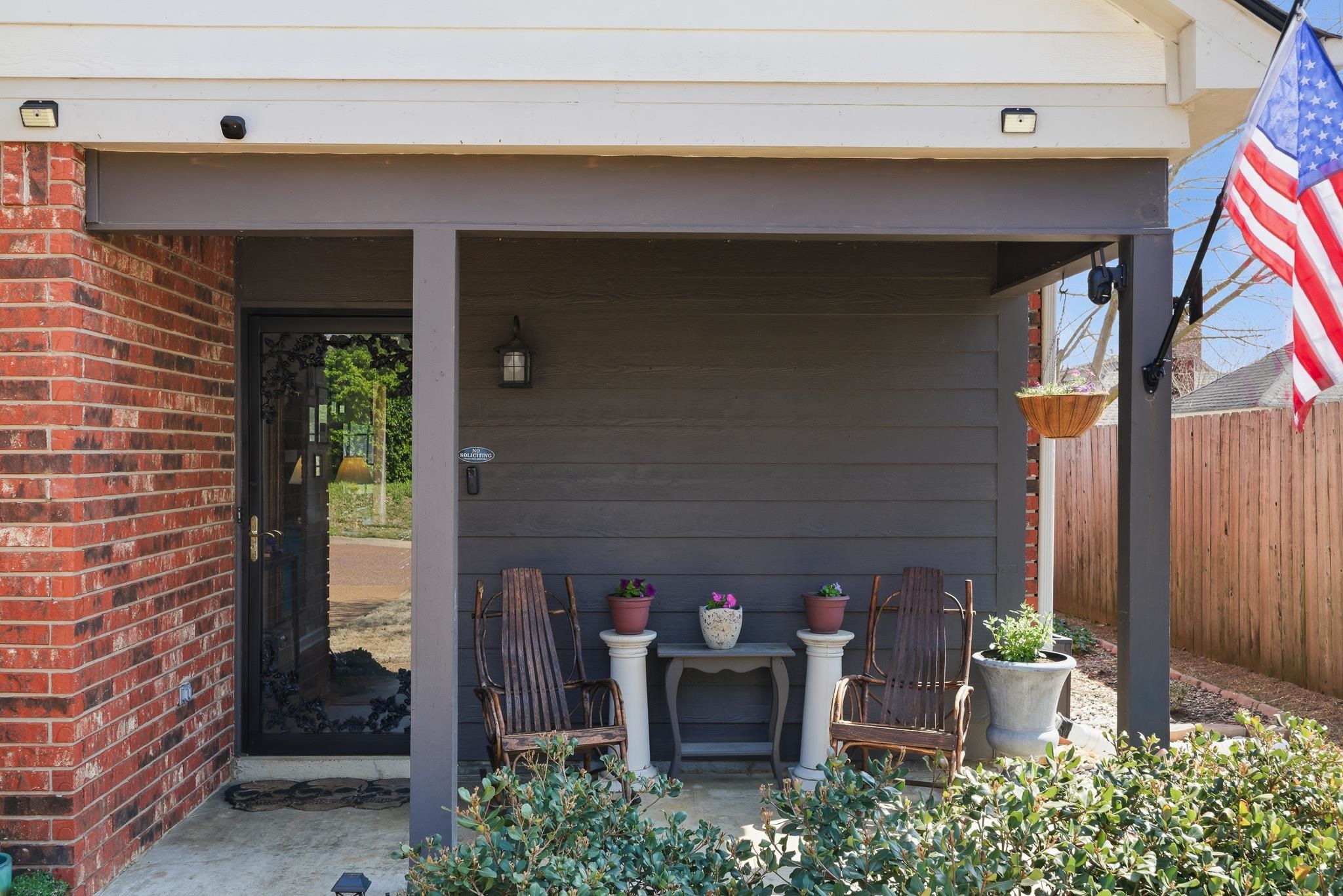 3546 Ripplechase Drive Bartlett, TN 38133 - Photo 2 of 24 a front view of a house with outdoor seating and garage