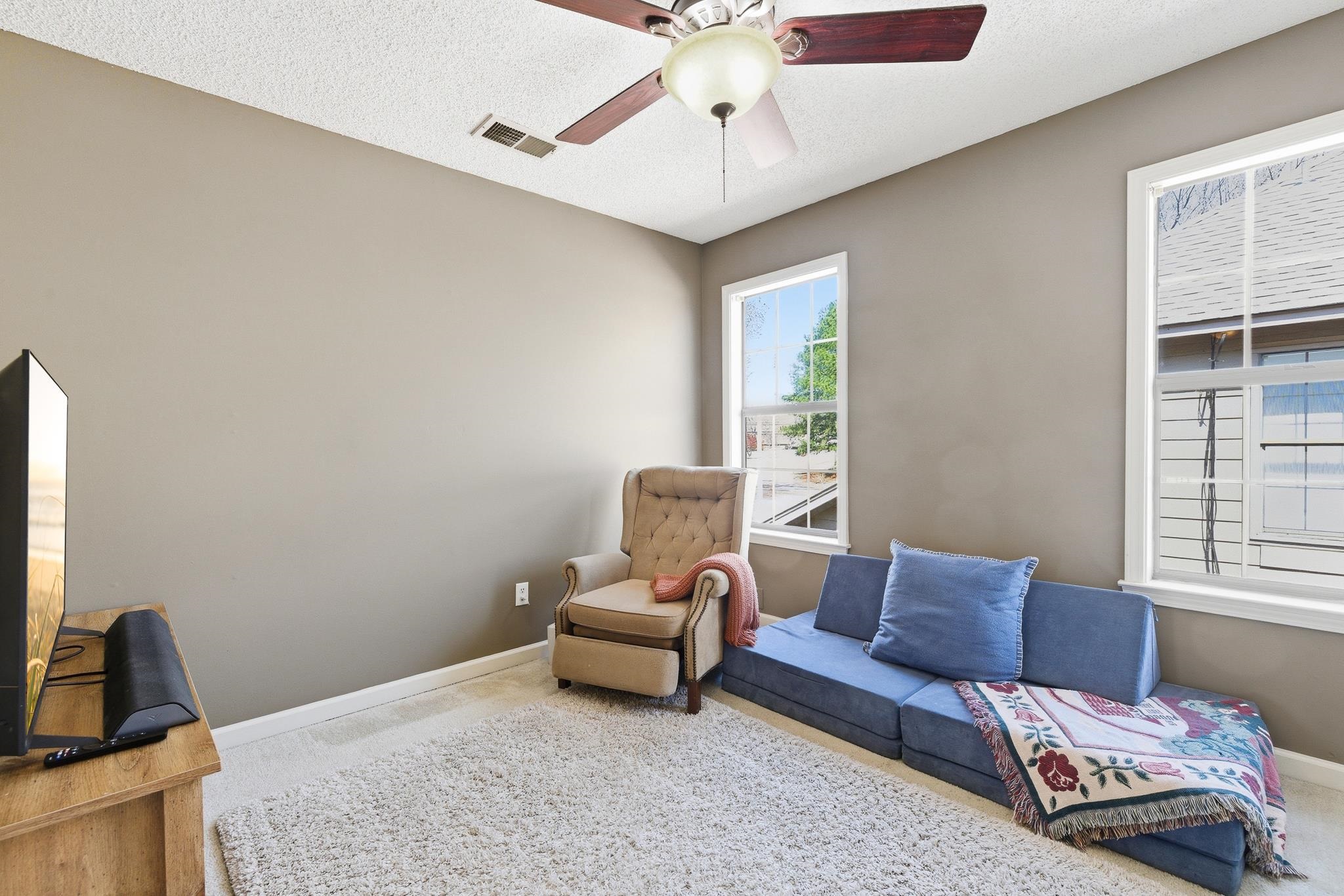 3546 Ripplechase Drive Bartlett, TN 38133 - Photo 21 of 24 a living room with furniture and a window