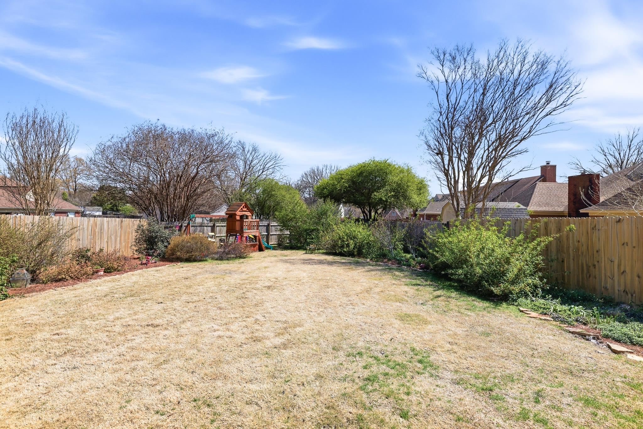 3546 Ripplechase Drive Bartlett, TN 38133 - Photo 24 of 24 a pathway of a house with a yard