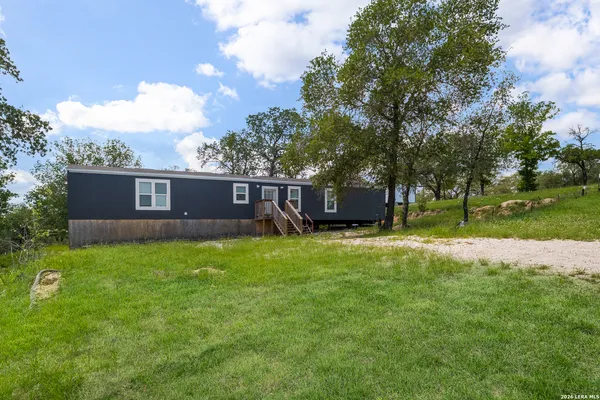 $187,000 | 173 Rocky Ridge Drive, Unit 153, Poteet, TX 78065