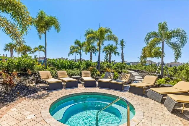 a view of a swimming pool with a patio