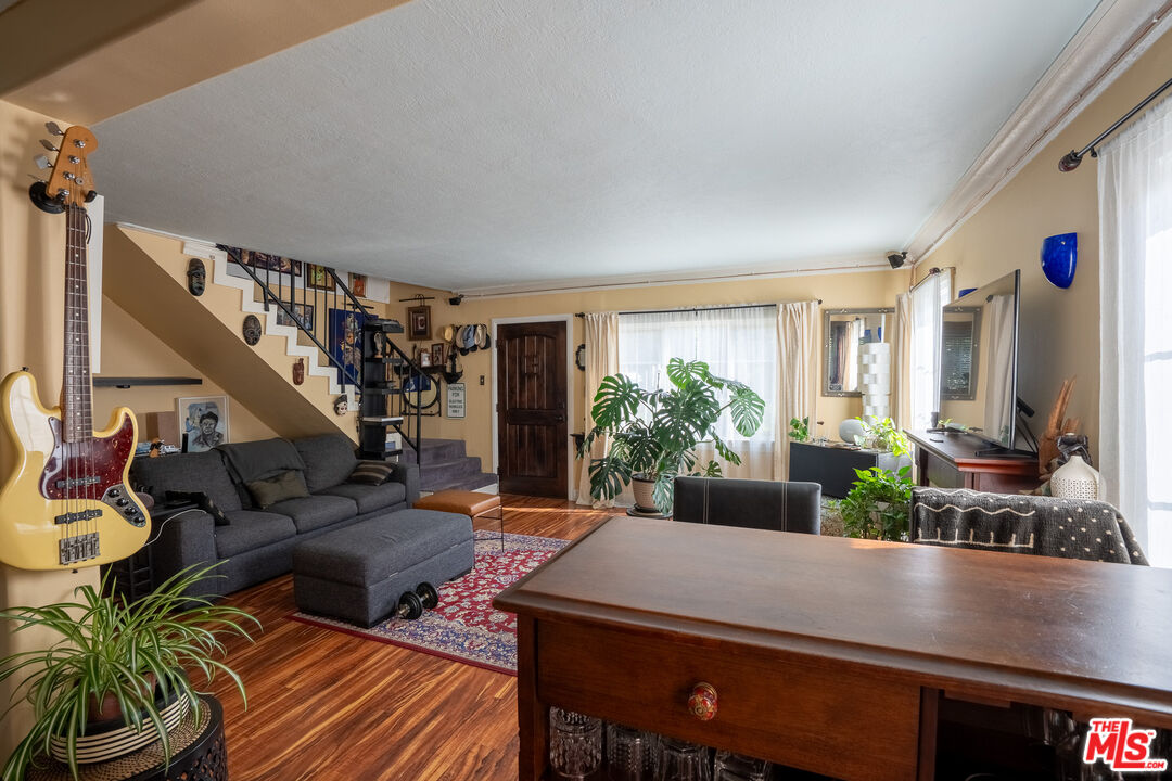 2045 Claudina Avenue Los Angeles, CA 90016 - Photo 12 of 33 a view of an entryway and livingroom with furniture