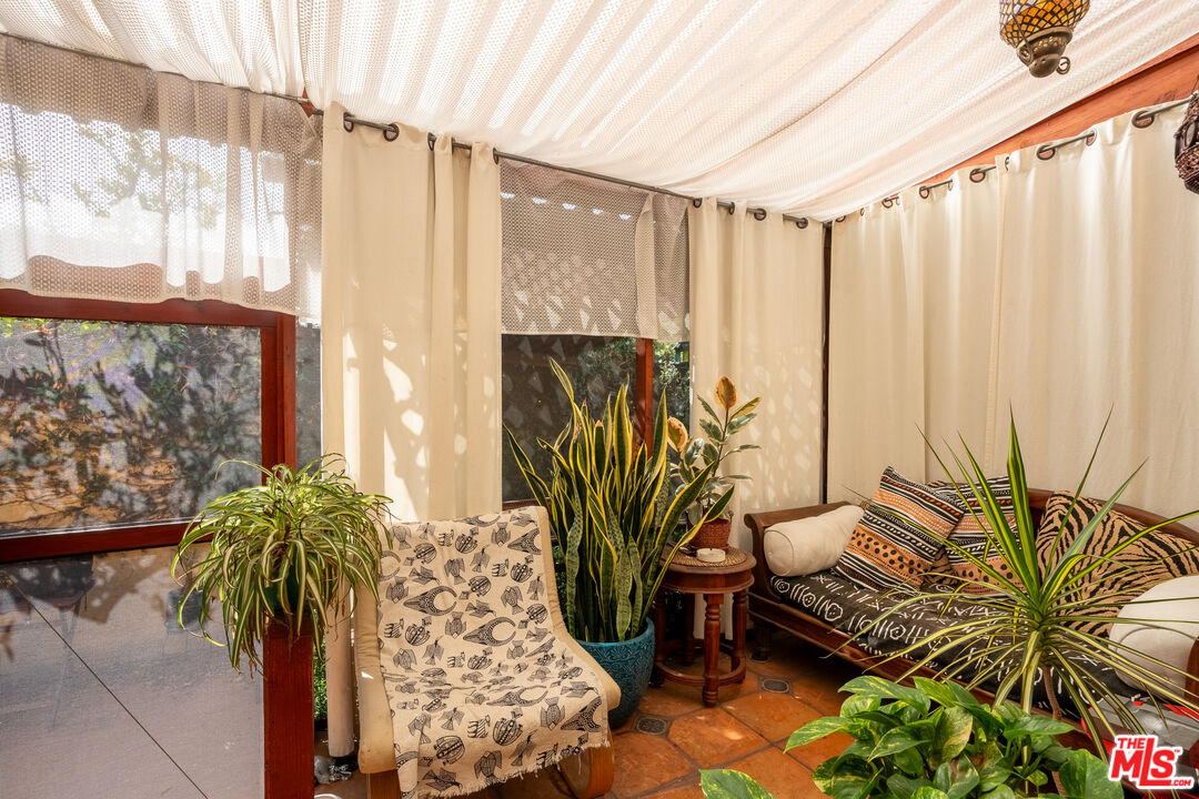 2045 Claudina Avenue Los Angeles, CA 90016 - Photo 15 of 33 a living room filled with furniture