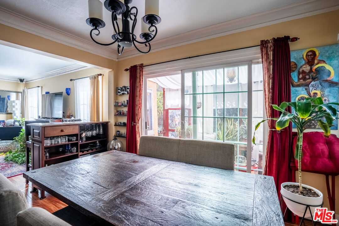2045 Claudina Avenue Los Angeles, CA 90016 - Photo 9 of 33 a room with furniture and a large window