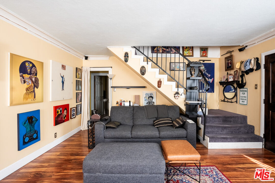 2045 Claudina Avenue Los Angeles, CA 90016 - Photo 10 of 33 a living room with furniture and wooden floor