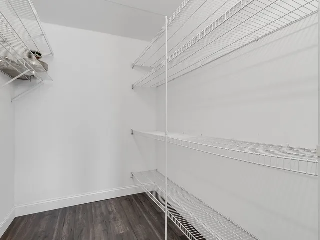 a view of a room with racks on the wall