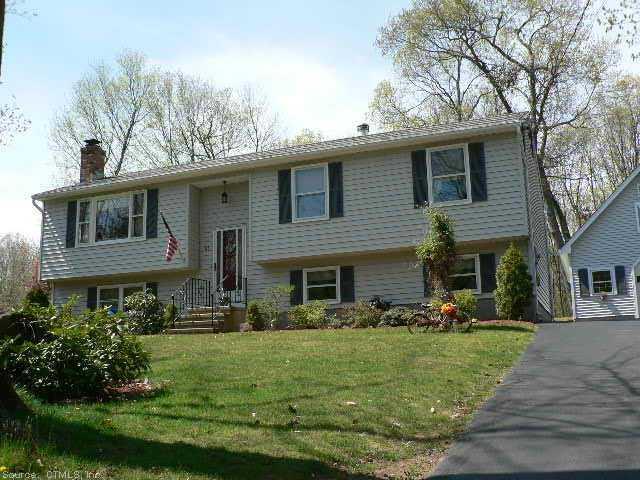 85 North Airline Road Wallingford, CT 06492 - Photo 1 of 1 a front view of a house with a yard