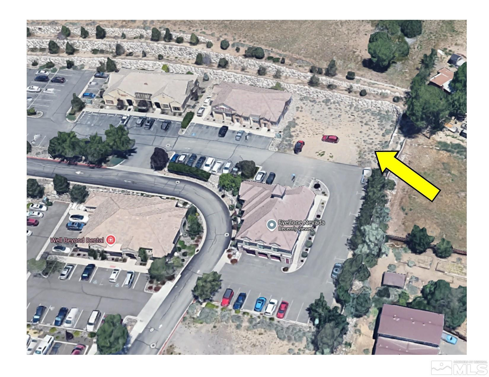 0 Mccarran, Unit 24 Reno, NV 89523 - Photo 2 of 4 an aerial view of a house with a swimming pool