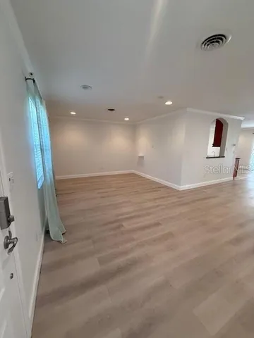 a bathroom with a double vanity sink toilet mirror and shower