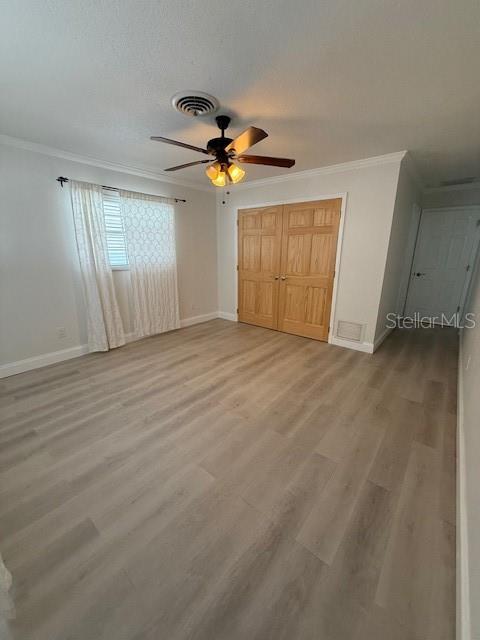 3856 Tarpon Road Venice, FL 34293 - Photo 21 of 24 a view of empty room with wooden floor