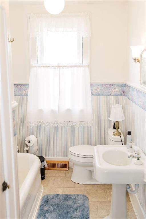 1898 Schellsburg Road Claysburg, PA 16625 - Photo 25 of 50 a bathroom with a sink and a bathtub