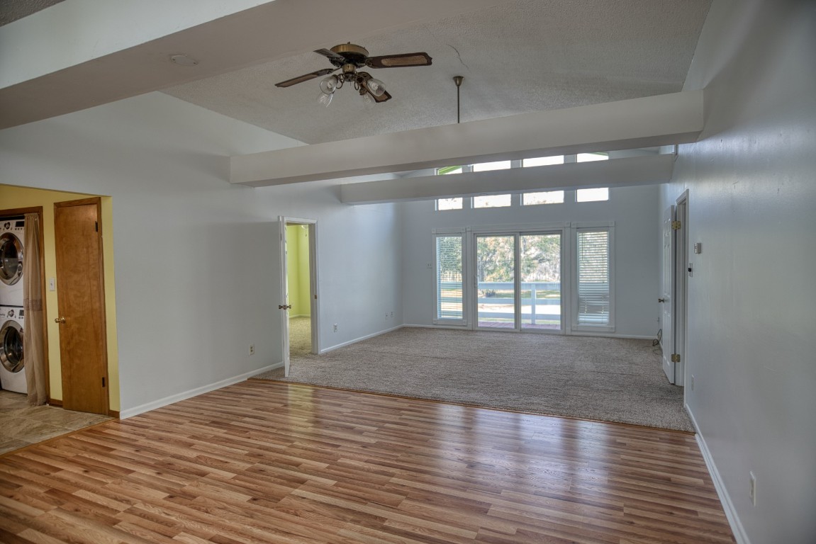 4641 Rio Drive Brazoria, TX 77422 - Photo 13 of 33 a view of empty room with wooden floor and fan