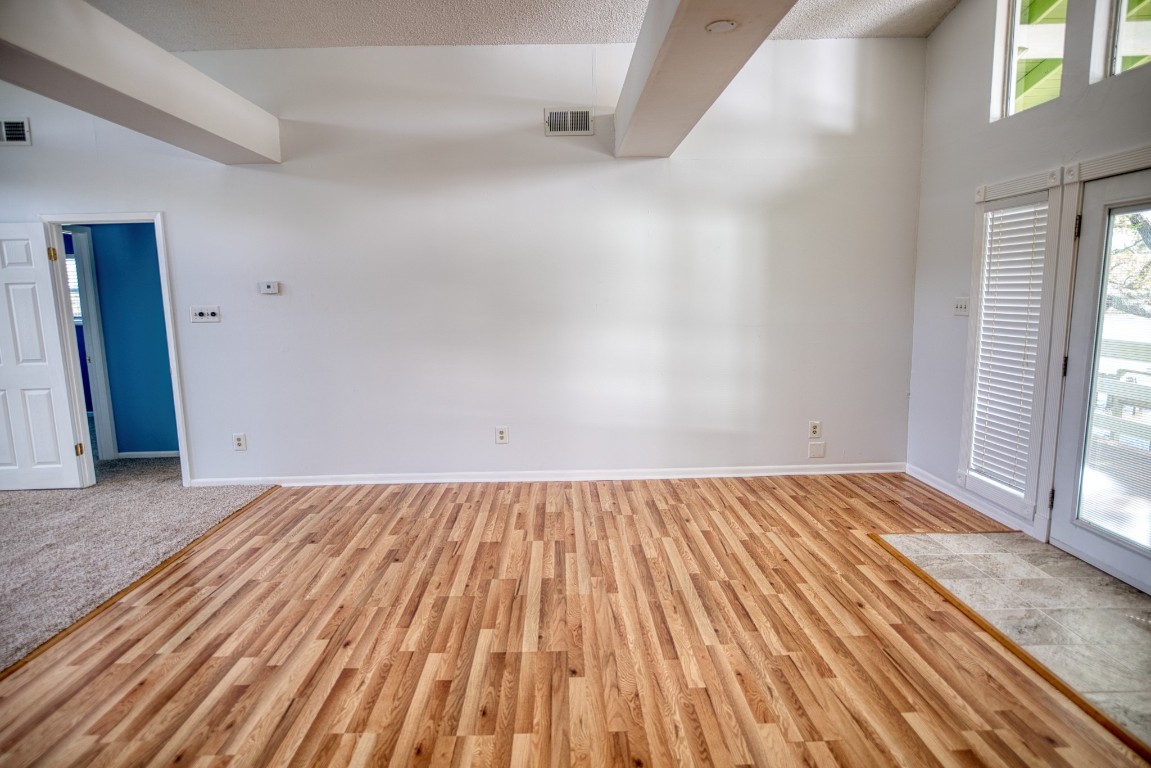 4641 Rio Drive Brazoria, TX 77422 - Photo 19 of 33 a view of a room with wooden floor and bench