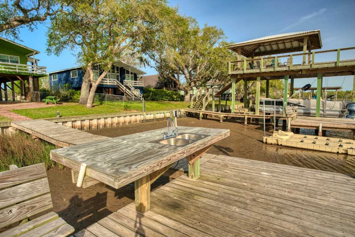 4641 Rio Drive Brazoria, TX 77422 - Photo 6 of 33 a view of a patio with a table and chairs