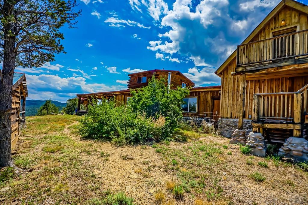 31300 Timber Canyon Road Trinidad, CO 81082 - Photo 54 of 59 a view of a house with a yard