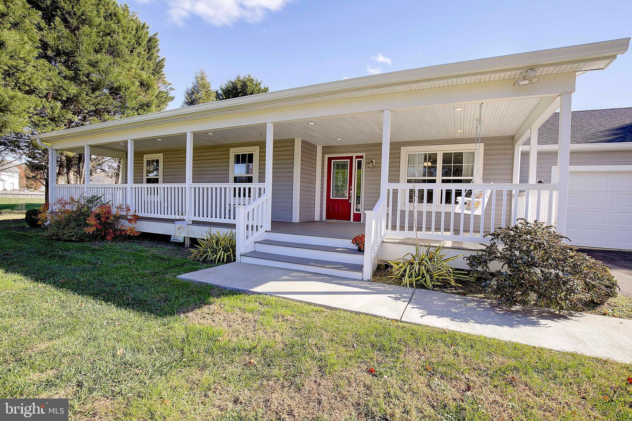 26282 Rio Bravo Lane Mechanicsville, MD 20659 - Photo 2 of 52 front view of a house with a yard