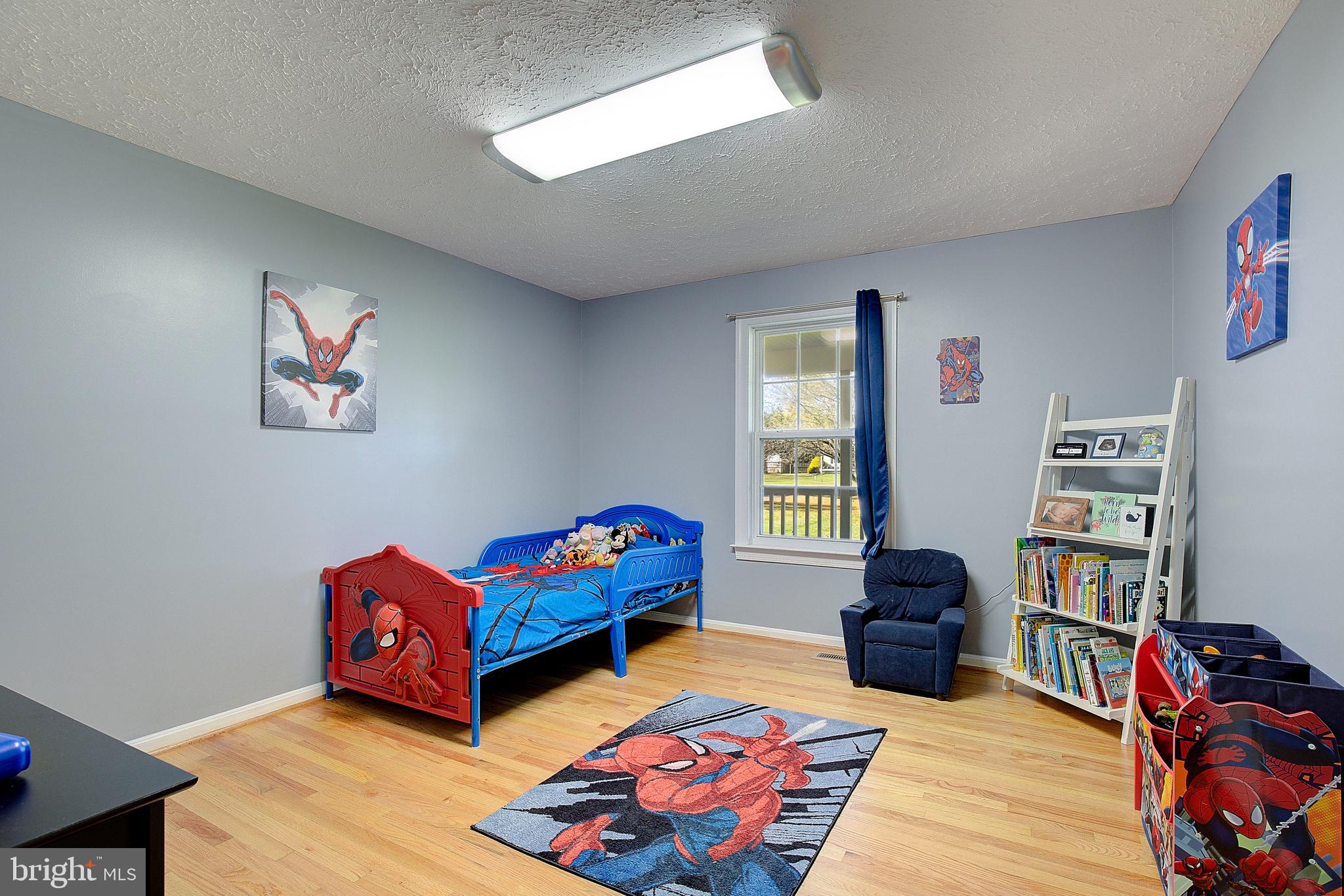 26282 Rio Bravo Lane Mechanicsville, MD 20659 - Photo 21 of 52 a bedroom with furniture toys and a window