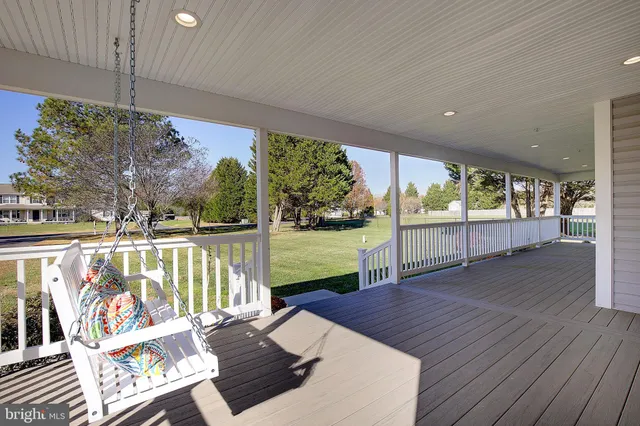 a view of a floor to ceiling window and wooden floor