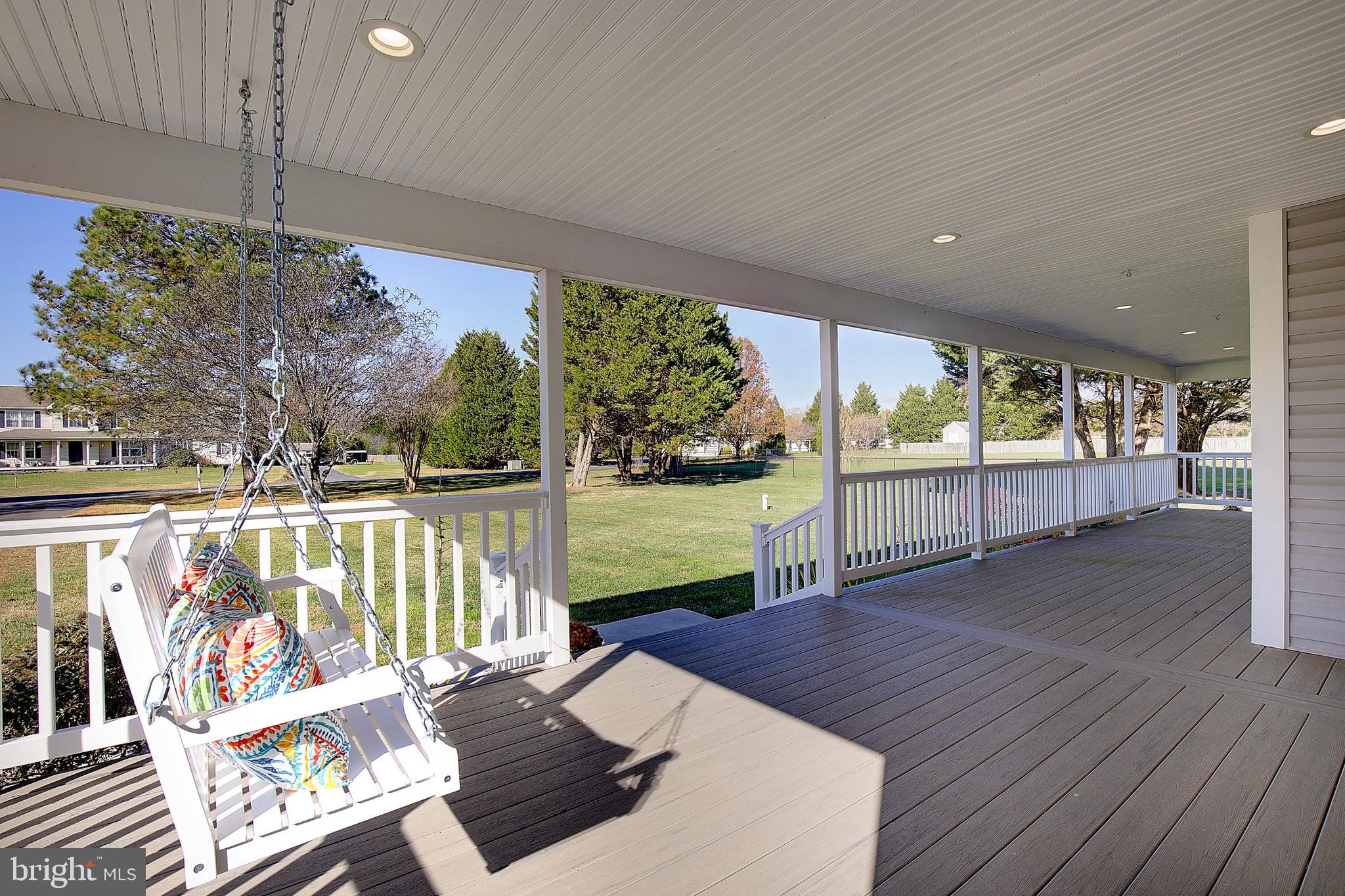 26282 Rio Bravo Lane Mechanicsville, MD 20659 - Photo 3 of 52 a view of a floor to ceiling window and wooden floor