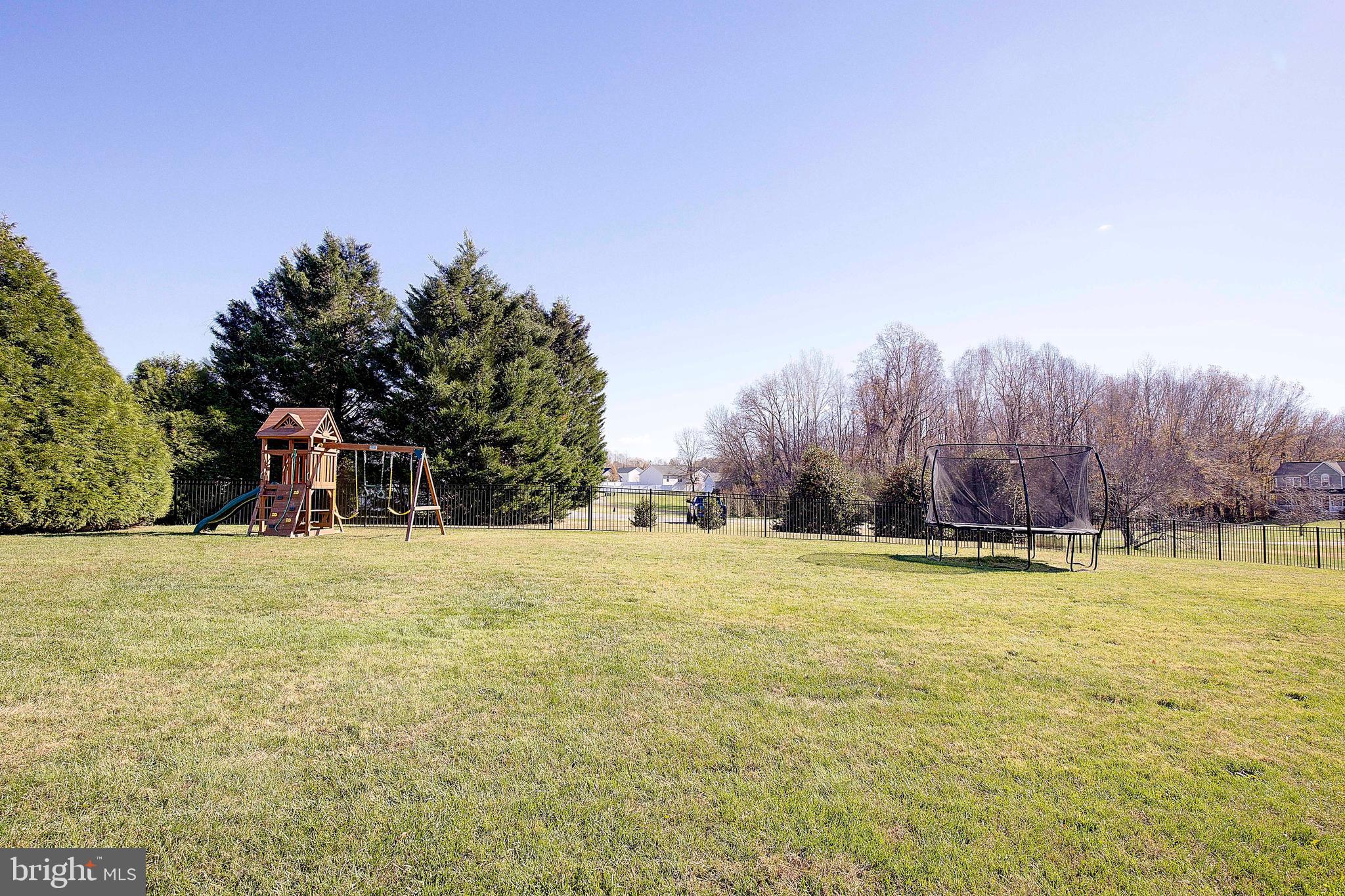 26282 Rio Bravo Lane Mechanicsville, MD 20659 - Photo 40 of 52 a swimming pool with trees in the background