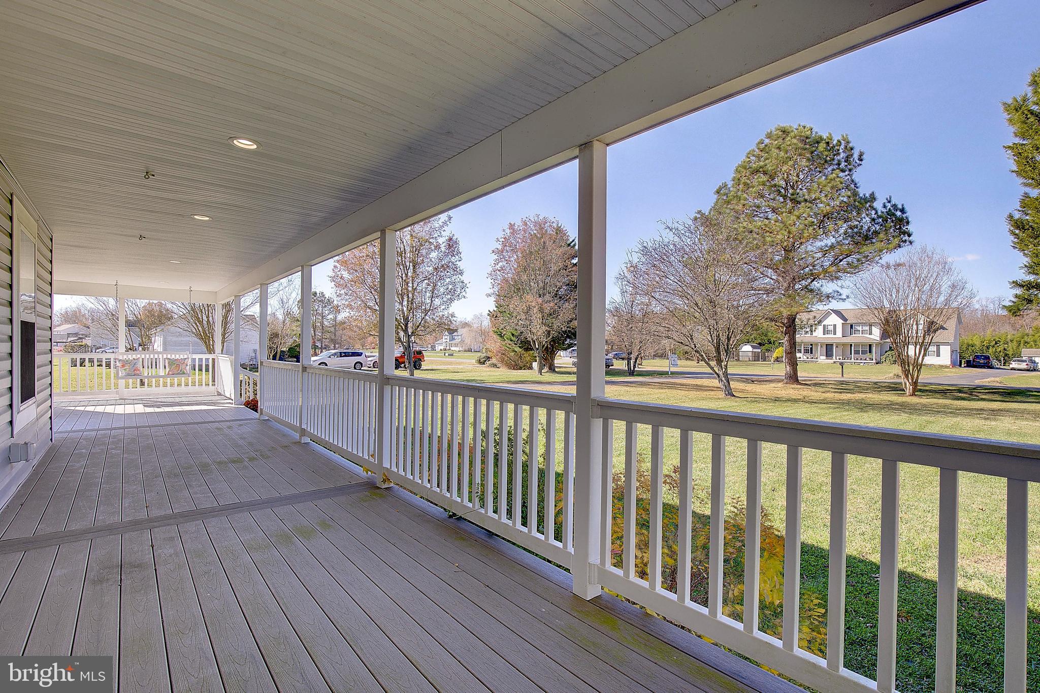 26282 Rio Bravo Lane Mechanicsville, MD 20659 - Photo 45 of 52 a view of a porch with wooden floor and fence