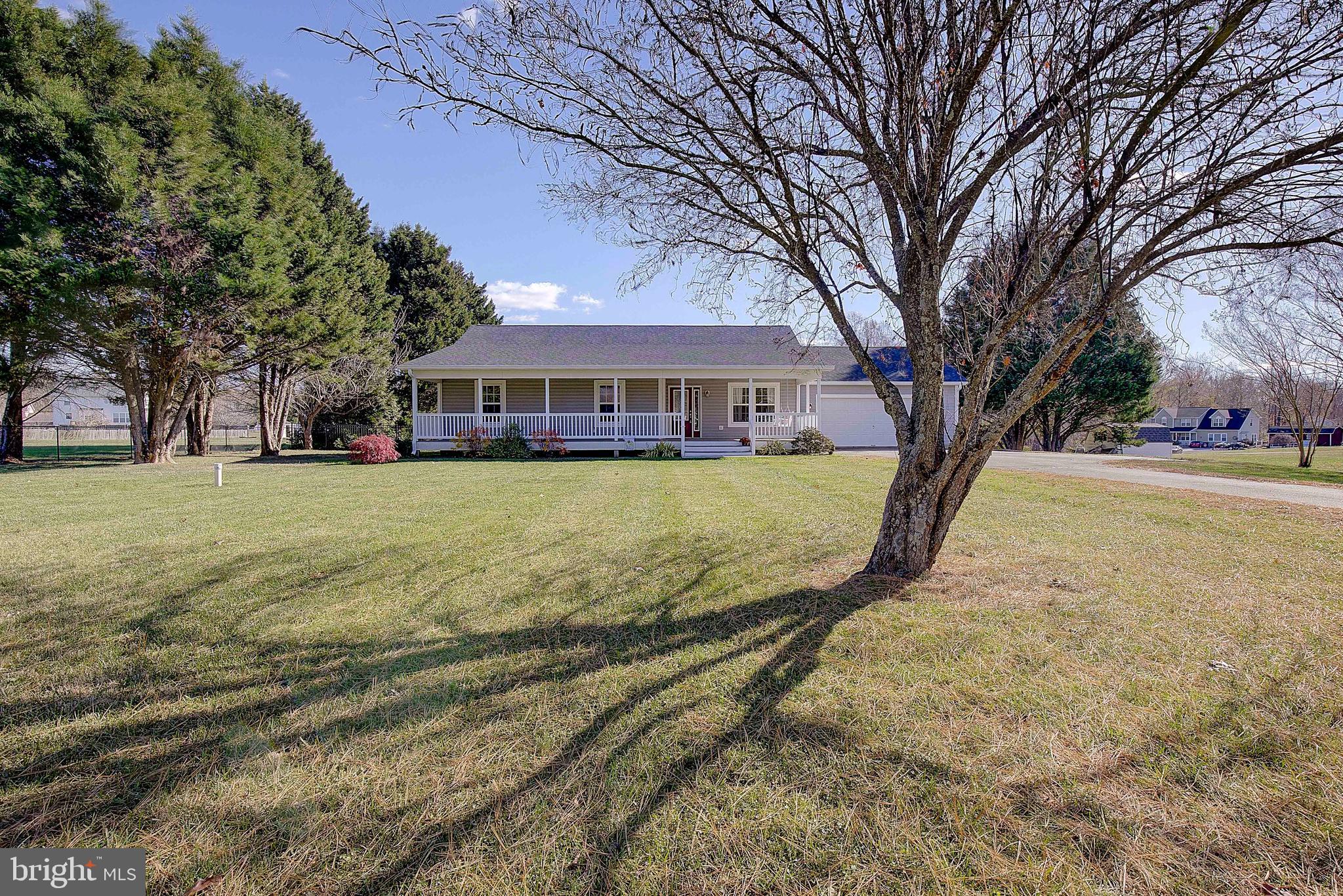 26282 Rio Bravo Lane Mechanicsville, MD 20659 - Photo 47 of 52 a view of a house with a yard and tree s