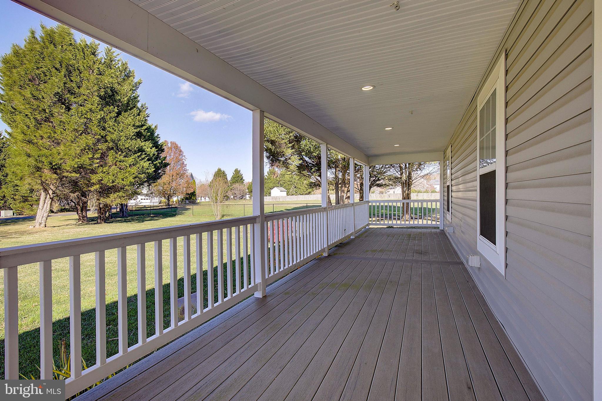 26282 Rio Bravo Lane Mechanicsville, MD 20659 - Photo 48 of 52 a view of a porch with wooden floor and outdoor space