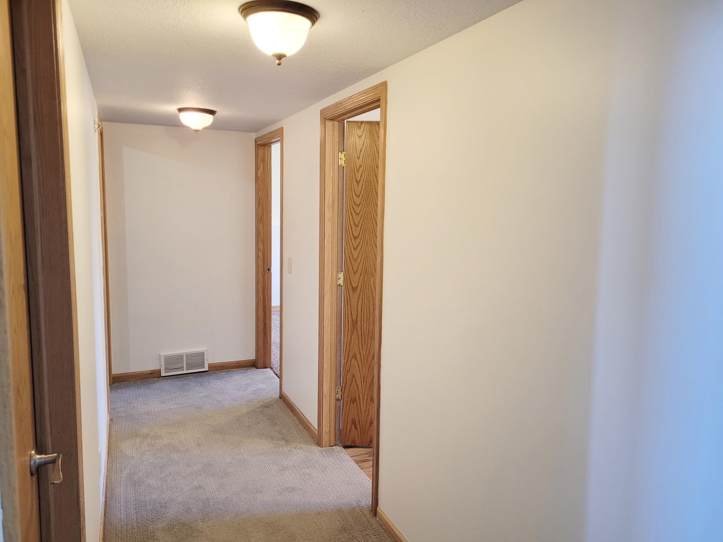 7228 Hancock Road Montague, MI 49437 - Photo 11 of 38 Upstairs hall. 3 bdrm..up