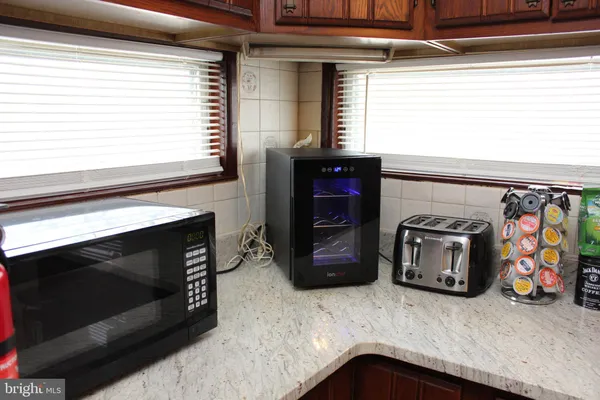 a kitchen with a stove and a microwave
